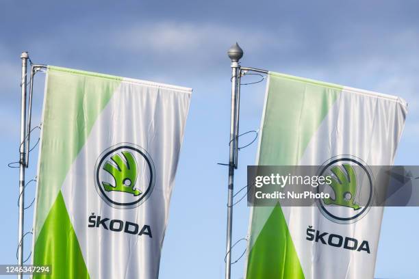 Flags with Skoda logo in Gliwice, Poland on January 14, 2023.