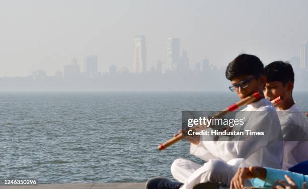 City skyline enveloped in dense smog, at Marine Drive on January 17, 2023 in Mumbai, India.