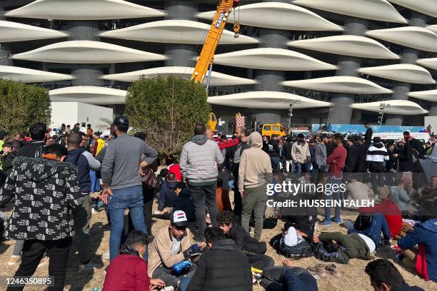 Iraq's supporters gather outside the Basra International Stadium in the country's southern city on January 19 after a stampede took place hours...