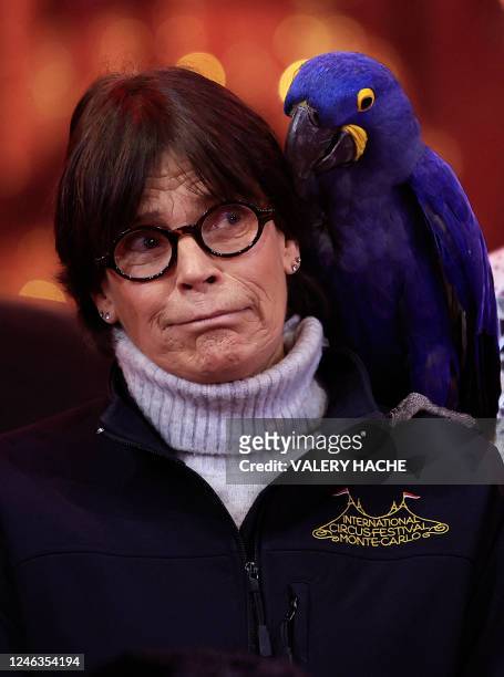 Princess Stephanie of Monaco poses with a parrot on her shoulder during a photocall for the opening of the 45th Monte-Carlo International Circus...