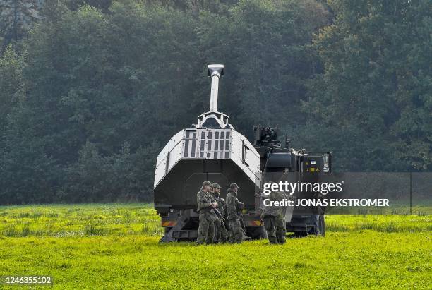 Picture taken on October 14, 2017 shows the Swedish Defense Forces' artillery piece Archer displayed in connection with an exercise during the Aurora...