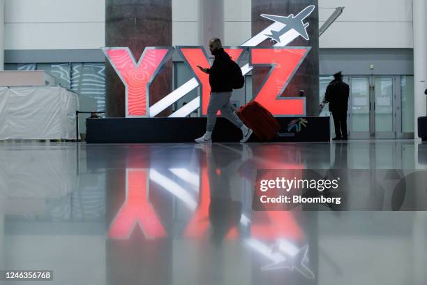 Travelers at Toronto Pearson International Airport in Toronto, Ontario, Canada, on Thursday, Jan. 18, 2023. Total tourism spending in 2023 is...