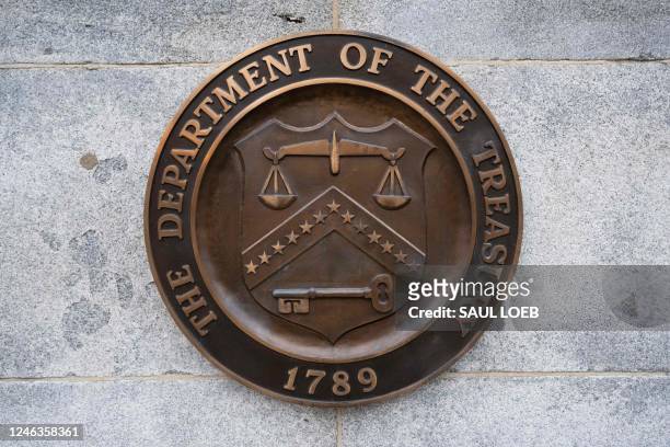 The seal of the on the US Treasury Department building is seen in Washington, DC, January 19 following an announcement by the US Treasury that it had...