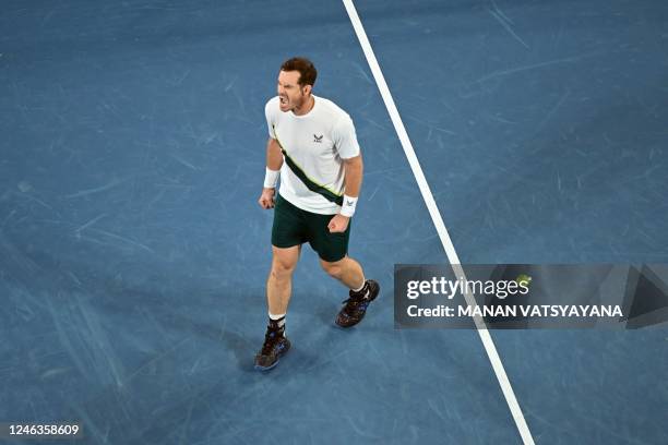 Britain's Andy Murray celebrates after victory against Australia's Thanasi Kokkinakis during their men's singles match on day four of the Australian...