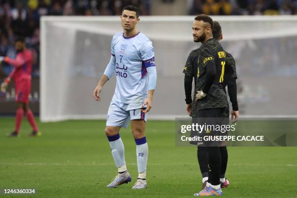 Riyadh All-Star's Portuguese forward Cristiano Ronaldo , Paris Saint-Germain's Argentine forward Lionel Messi , and Paris Saint-Germain's Brazilian...