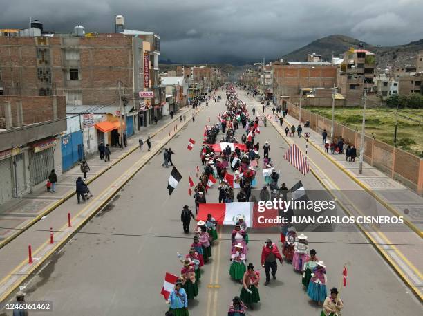 Demonstrators hold a protest against the government of President Dina Boluarte and to demand her resignation, in Puno, Peru, on January 19, 2023. -...