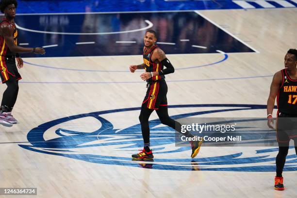 Dejounte Murray of the Atlanta Hawks smiles against the Dallas Mavericks on January 18, 2023 at the American Airlines Center in Dallas, Texas. NOTE...