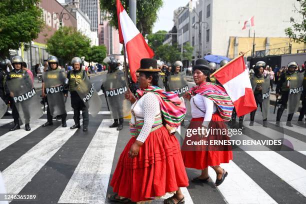 People from different parts of Peru protest against the government of President Dina Boluarte in Lima on January 19, 2023. - Lima was on edge...