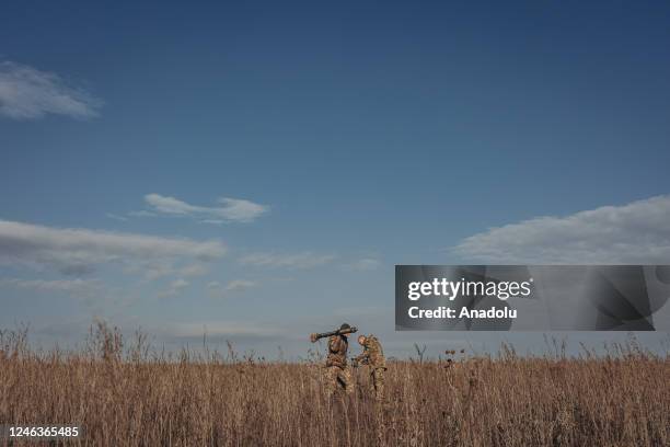 Ukrainian soldiers practice with a mortar on the Donbass frontline as military mobility continues within the Russian-Ukrainian war, on January 19,...