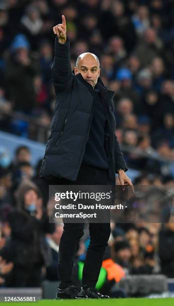 Manchester City manager Josep Guardiola shouts instructions to his team from the technical area during the Premier League match between Manchester...