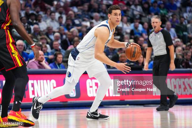 Dwight Powell of the Dallas Mavericks dribbles the ball against the Atlanta Hawks on January 18, 2023 at the American Airlines Center in Dallas,...