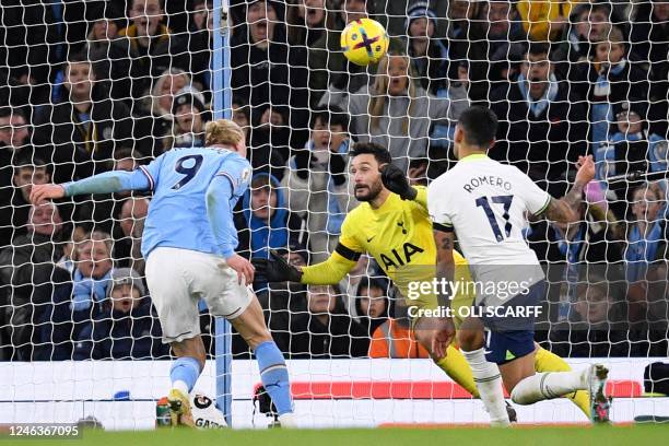 Manchester City's Norwegian striker Erling Haaland scores the team's second goal past Tottenham Hotspur's French goalkeeper Hugo Lloris during the...