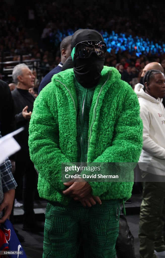 Rapper Lil Baby Attends The Game Of The Chicago Bulls Against The
