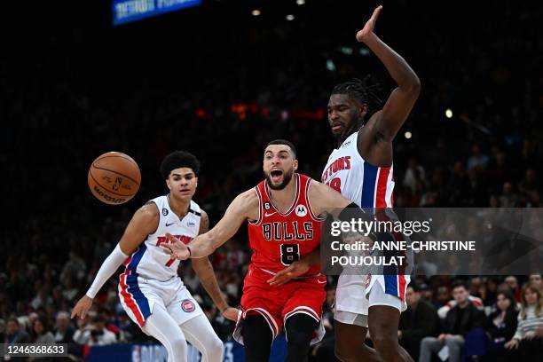 Chicago Bulls' US small forward Zach LaVine fights for the ball with Detroit Pistons' French guard Killian Hayes during the 2023 NBA Paris Games...