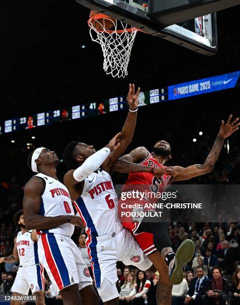 Detroit Pistons' US guard Hamidou Diallo scores in front of Chicago Bulls' US power forward Derrick Jones Jr during the 2023 NBA Paris Games...
