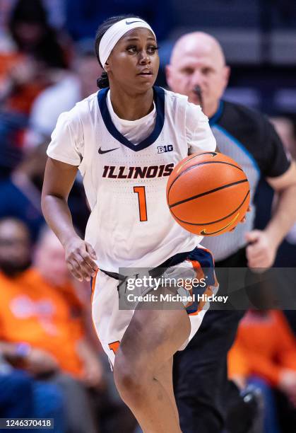 Genesis Bryant of the Illinois Fighting Illini brings the ball up court during the game against the Indiana Hoosiers at State Farm Center on January...