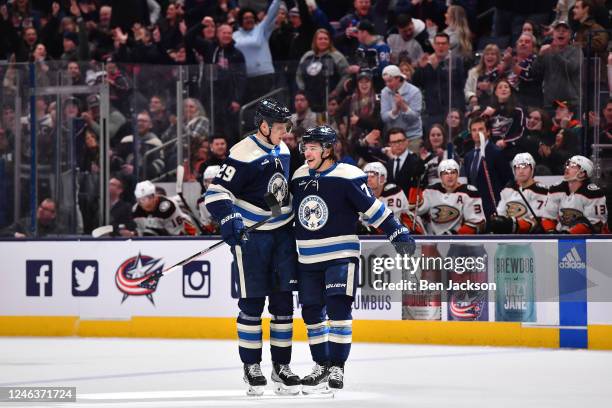 Nick Blankenburg of the Columbus Blue Jackets celebrates with teammate Patrik Laine of the Columbus Blue Jackets after scoring a goal during the...