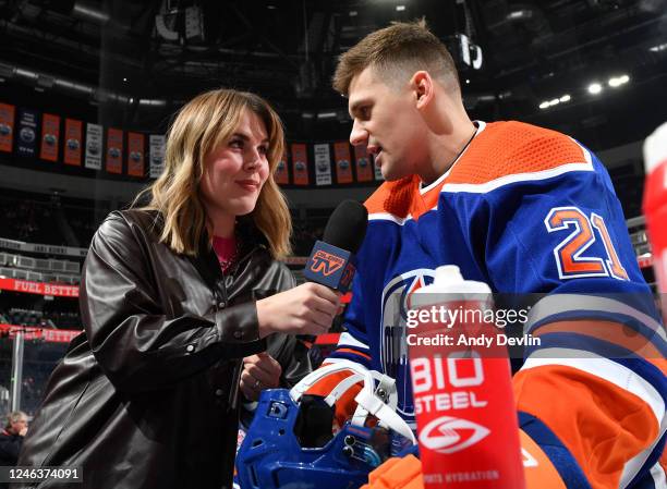 Baillie Scheetz interviews Klim Kostin of the Edmonton Oilers during warm ups before the game against the Tampa Bay Lightning on January 19, 2023 at...