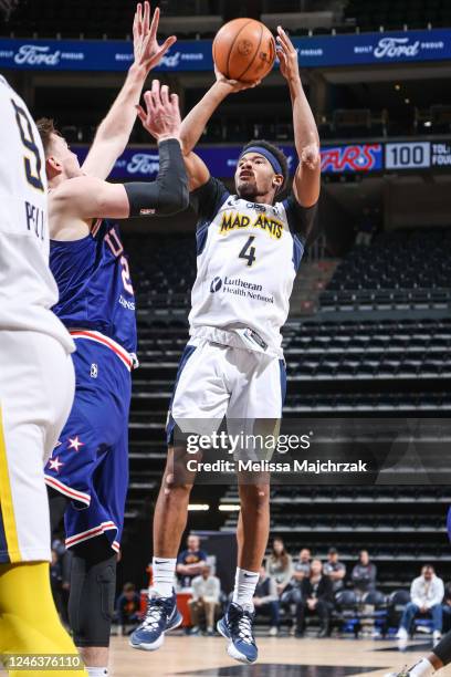 Salt Lake City, UT Devonte Shuler of the Fort Wayne Mad Ants shoots the ball against Micah Potter of the Salt Lake City Stars at vivint.SmartHome...