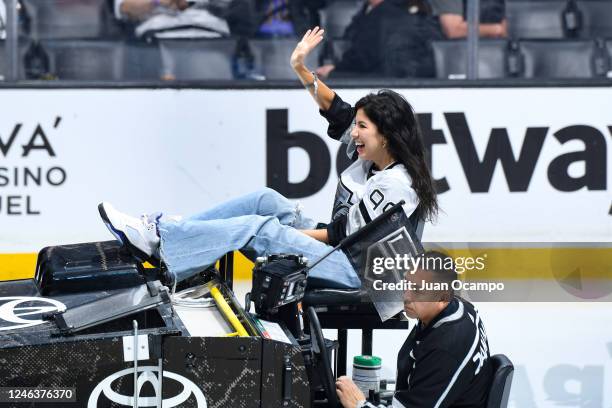 Stephanie Beatriz waves while riding the Zamboni during the second period between the Dallas Stars and the Los Angeles Kings at Crypto.com Arena on...