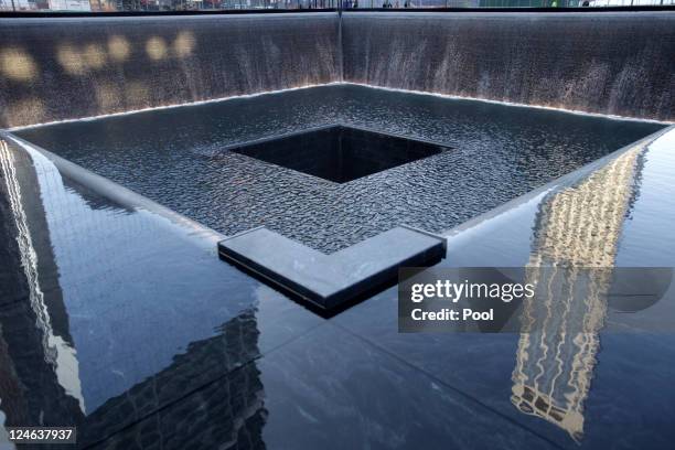 Water flows in a 9/11 Memorial pool during the tenth anniversary ceremonies of the September 11, 2001 terrorist attacks at the World Trade Center...