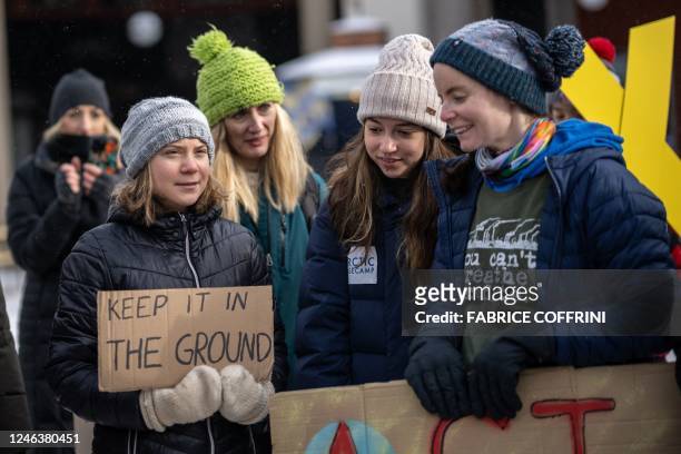 Sweden's Greta Thunberg and other young climate activists of the "Fridays for Future" movement stage an unauthorised demonstration on the closing day...