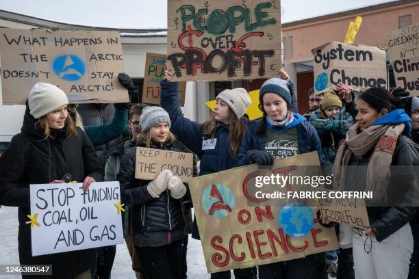 Germany's Luisa Neubauer , Sweden's Greta Thunberg and other young climate activists of the "Fridays for Future" movement stage an unauthorised...