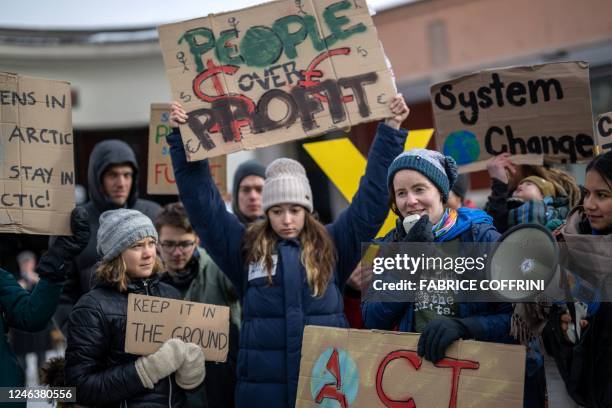 Sweden's Greta Thunberg and other young climate activists of the "Fridays for Future" movement stage an unauthorised demonstration on the closing day...