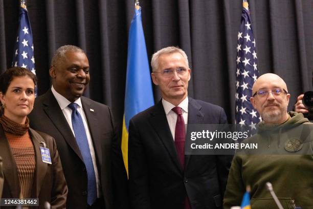 Ukrainian Defence Minister Oleksii Reznikov poses with NATO Secretary General Jens Stoltenberg , Icelandic Defence Minister Thordis Kolbrun R...