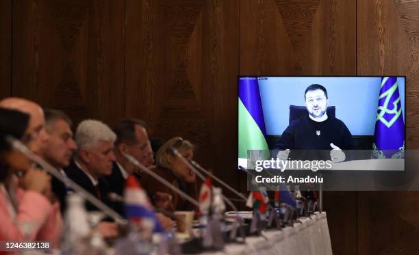 Ukrainian President Volodymyr Zelensky speaks during the Ukraine Defense Contact Group meeting via video link at the Ramstein Air Base in...