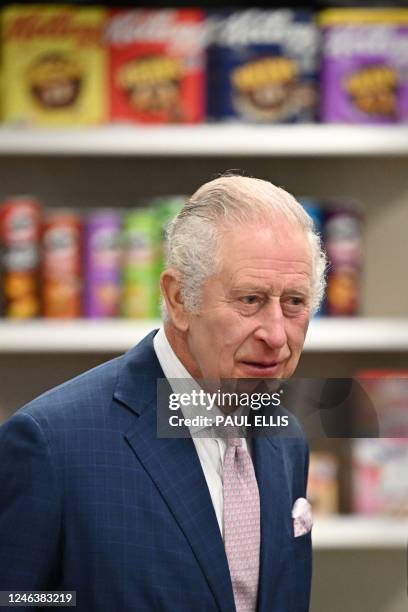 Britain's King Charles III visits the headquarters of cereal manufacturer Kellogg's marking its 100th anniversary in Manchester, north west England,...