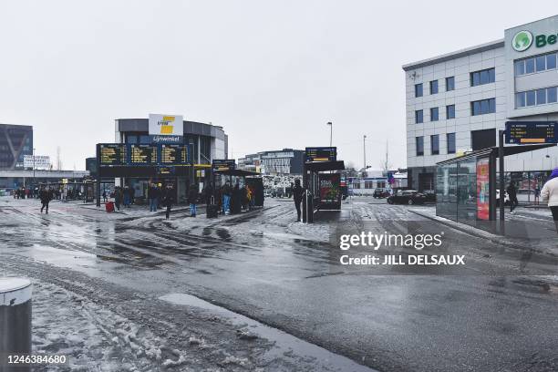 Illustration shows an empty bus station in the snow in Hasselt, Friday 20 January 2023. BELGA PHOTO JILL DELSAUX
