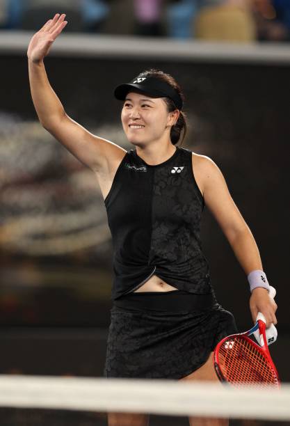 China's Zhu Lin celebrates after victory against Greece's Maria Sakkari during their women's singles match on day five of the Australian Open tennis...
