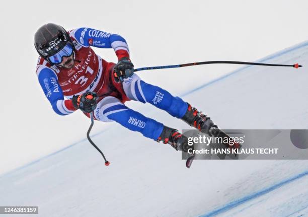 France's Cyprien Sarrazin races during the men's "Kitzbuehel ski course" downhill competition of the FIS Ski World Cup in Kitzbuehel, Austria, on...