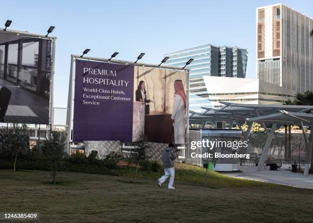 Billboard advertising hospitality in the King Abdullah Financial District in Riyadh, Saudi Arabia, on Thursday, Jan. 19, 2023. Mostly shut off to...