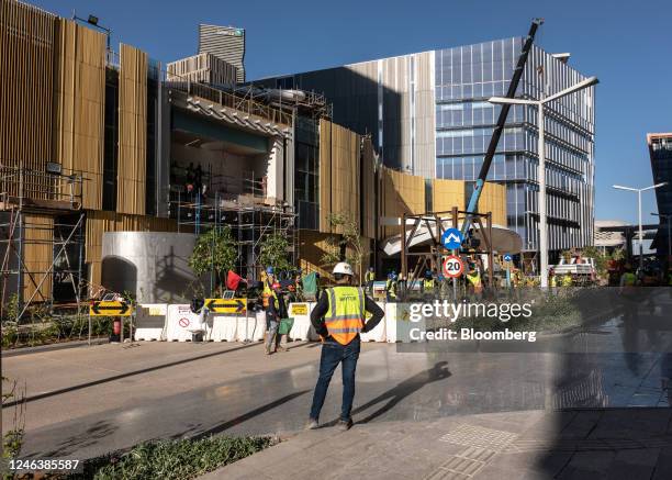 Construction workers on a commercial site in the King Abdullah Financial District in Riyadh, Saudi Arabia, on Thursday, Jan. 19, 2023. Mostly shut...