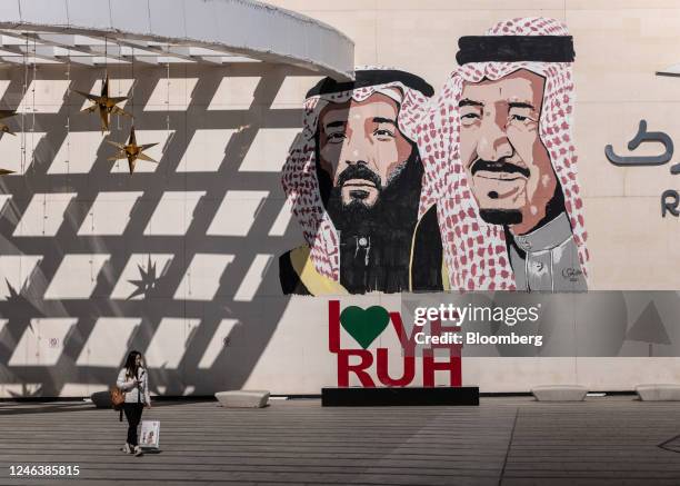 Wall mural displaying Saudi Arabia's Crown Prince Mohammed bin Salman, left, and Saudi Arabia's King Salman bin Abdulaziz, outside Riyadh Park...