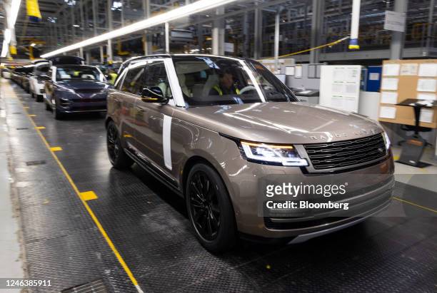 Range Rover sports utility vehicle moves along the production line at Tata Motors Ltd.'s Jaguar Land Rover vehicle manufacturing plant in Solihull,...