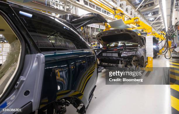 Range Rover sports utility vehicles on the production line at Tata Motors Ltd.'s Jaguar Land Rover vehicle manufacturing plant in Solihull, UK, on...