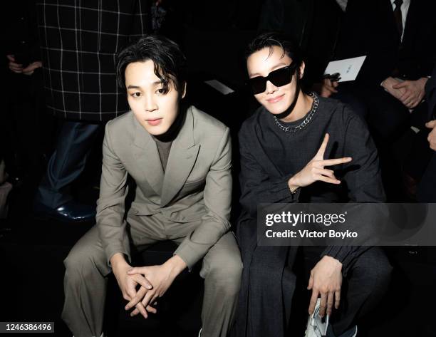 Jimin and J-Hope attend the Dior Homme Menswear Fall-Winter 2023-2024 show as part of Paris Fashion Week on January 20, 2023 in Paris, France.