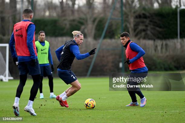 Mykhailo Mudryk and Thiago Silva of Chelsea during a training session at Chelsea Training Ground on January 20, 2023 in Cobham, England.