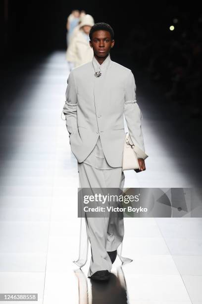 Model walks the runway during the Dior Homme Menswear Fall-Winter 2023-2024 show as part of Paris Fashion Week on January 20, 2023 in Paris, France.