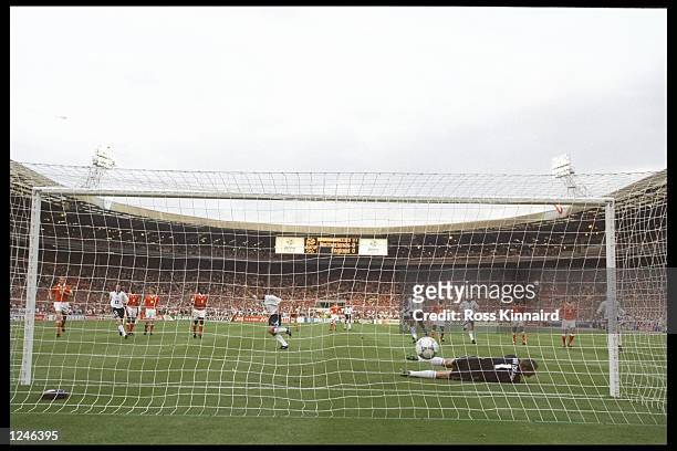 Alan Shearer of England scores a penalty against Holland in the Group A match at Wembley during the European Football Championships. England beat...