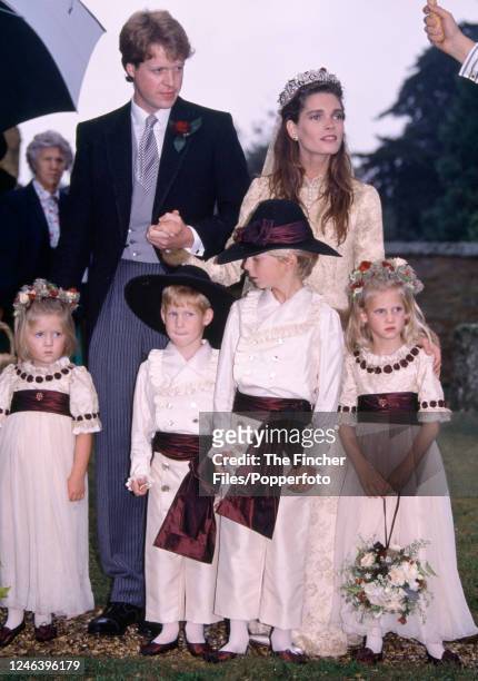 Front row, left to right, cousins Eleanor Fellowes, HRH Prince Harry, Alexander Fellowes and Emily McCorquodale as page boys and flower girls at the...