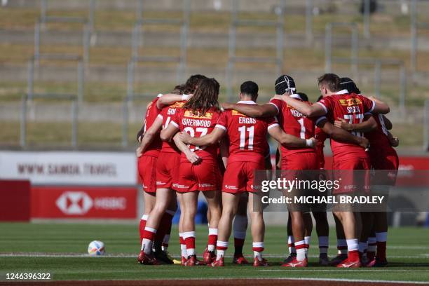 Canada have a team huddle in action in the match between South Africa and Canada during day one of the World Rugby Sevens series at FMG Stadium in...