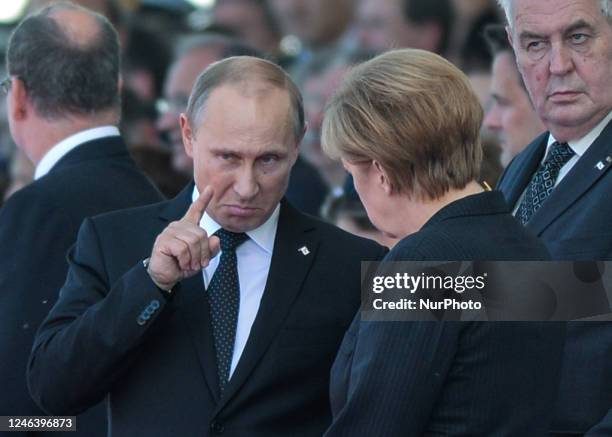 In this file photo German Chancellor Angela Merkel and Russian President Vladimir Putin came face to face as they attend commemoration ceremonies...