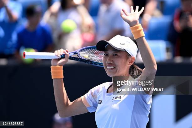 China's Zhang Shuai reacts after winning against USA's Katie Volynets during their women's singles match on day six of the Australian Open tennis...