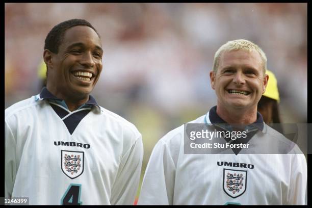 England players Paul Ince and Paul Gascoigne smile for the camera after England beat Holland in the Group A match at Wembley during the European...
