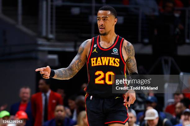 John Collins of the Atlanta Hawks reacts during the second half against the New York Knicks at State Farm Arena on January 20, 2023 in Atlanta,...