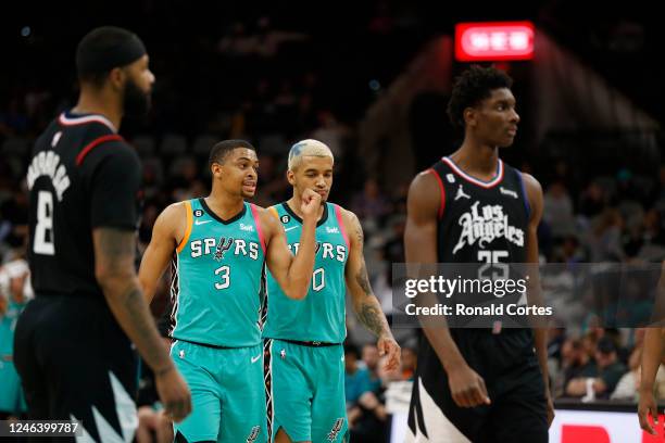 Keldon Johnson and Jeremy Sochan of the San Antonio Spurs confer late in the second half during game against the Los Angeles Clippers at AT&T Center...